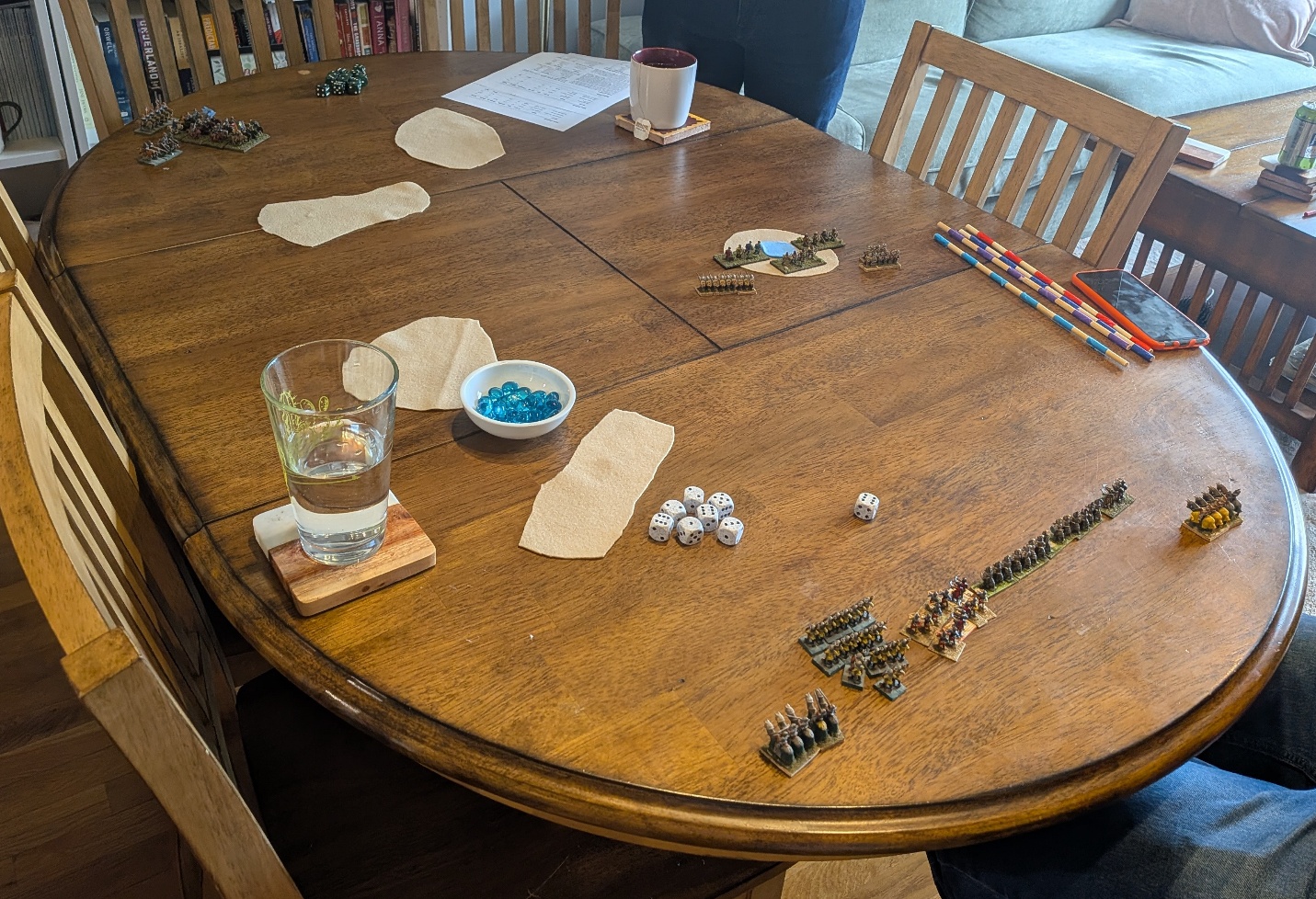 Tabletop setup for the Garrison of Ayn Turan, showing the well and opposing armies